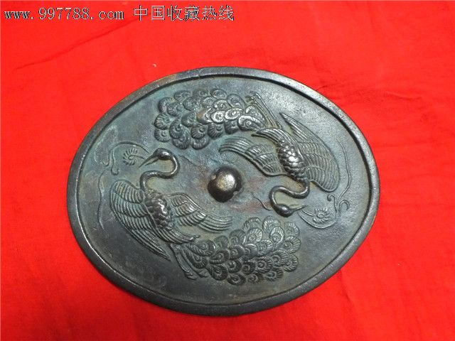 辽代椭圆形双凤铜镜