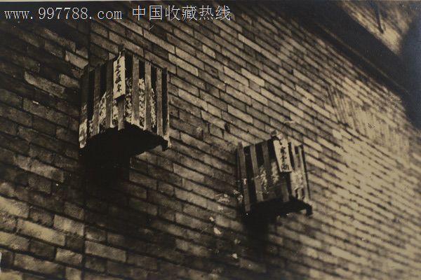 清末民初挂在城墙上的两个人头老照片带"泛银"