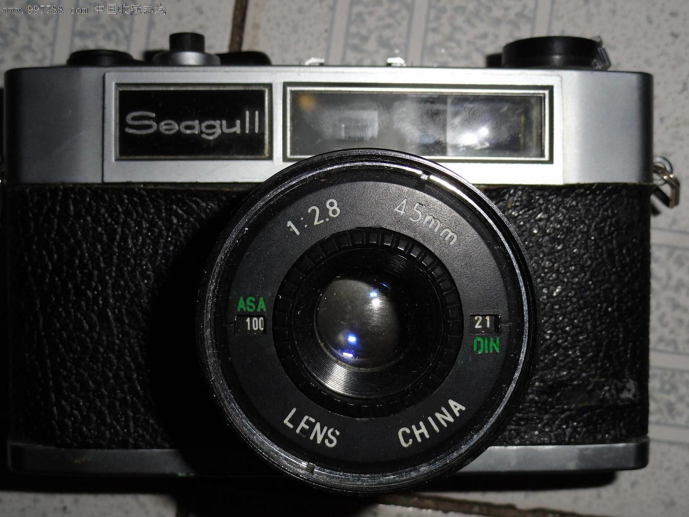 铝合金铸【海鸥88】老相机一个,带双皮套,机械正常.