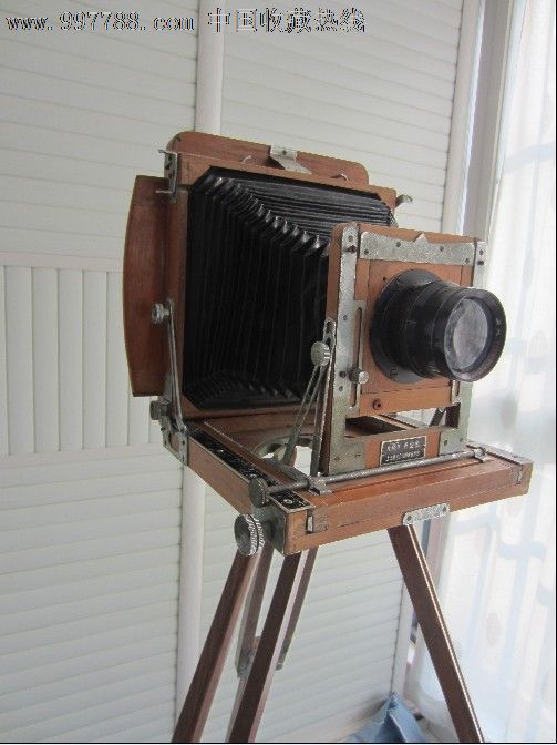 三角架皮腔式折叠照相机