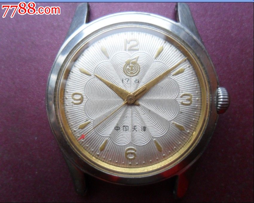 好品梅花放射纹金色四刻度指针17占天津五一手表