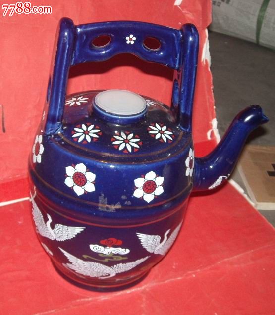 酒瓶:四君子老酒(2斤装大瓶,茶壶造型)品相完美.(网上首现)