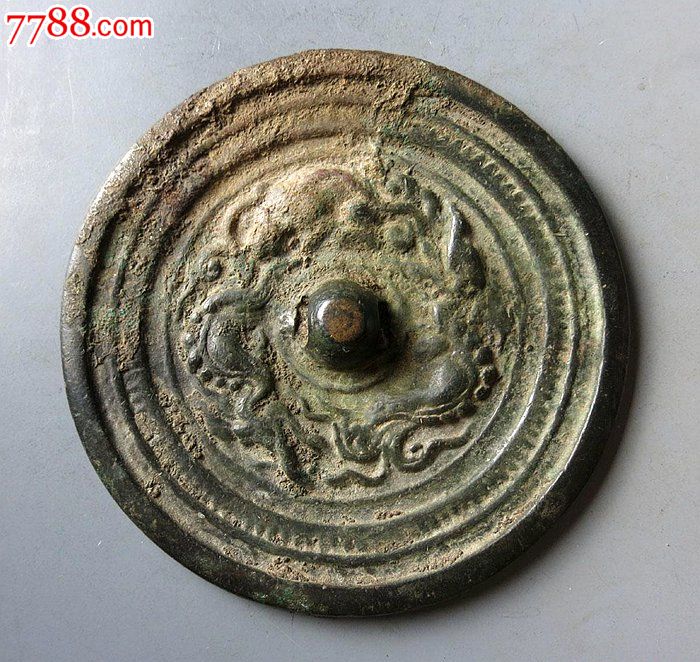 辽代浮雕跑兽铜镜