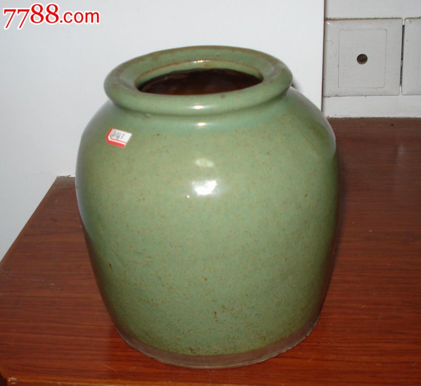 史杏妹"十二两子羊坛"绿釉罐(a1363)